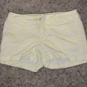White and yellow design American eagle shorts